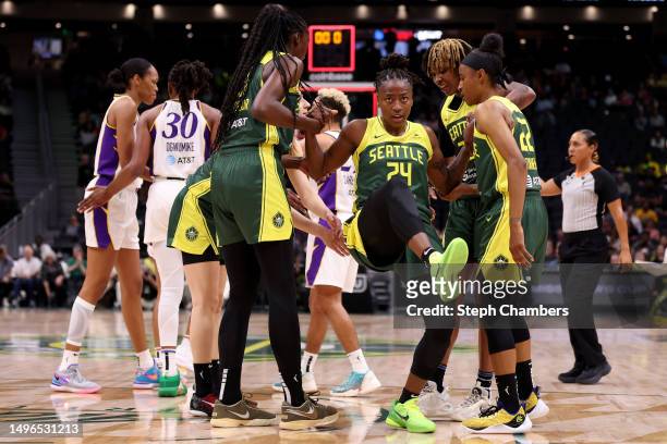 Jewell Loyd of the Seattle Storm reacts after her three point attempt while fouled during the second quarter against the Los Angeles Sparks at...