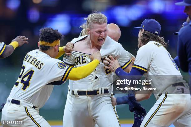 Joey Wiemer of the Milwaukee Brewers celebrates a walk off RBI single during the tenth inning of a game against the Baltimore Orioles at American...