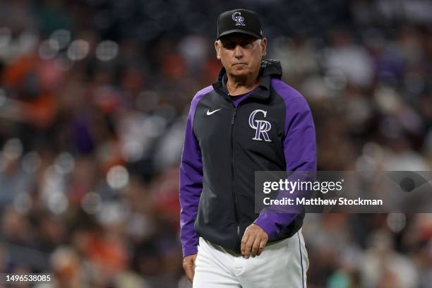Manager Bud Black of the of the Colorado Rockies walks back to the dugout after changing pitchers against the San Francisco Giants in the fifth...