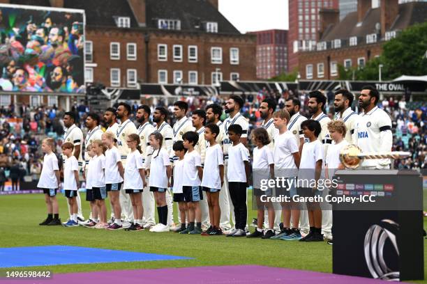 India players stand for their National Anthem during day one of the ICC World Test Championship Final between Australia and India at The Oval on June...