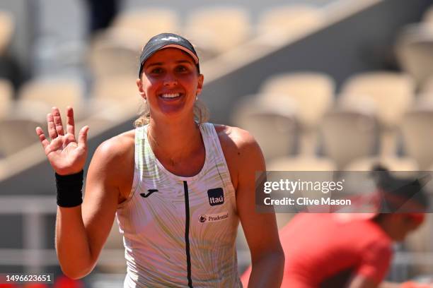 Beatriz Haddad Maia of Brazil waves after winning match point against Ons Jabeur of Tunisia during the Women's Singles Quarter Final match on Day...