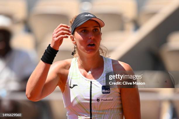 Beatriz Haddad Maia of Brazil celebrates winning match point against Ons Jabeur of Tunisia during the Women's Singles Quarter Final match on Day...