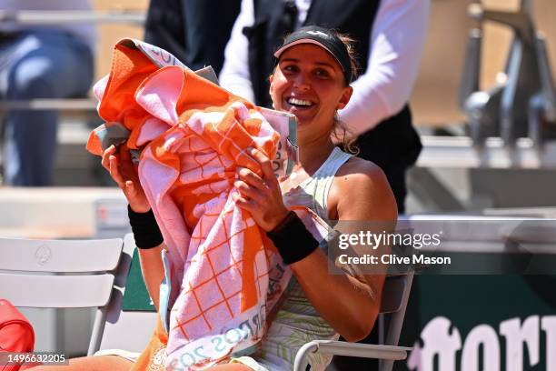 Beatriz Haddad Maia of Brazil celebrates winning match point against Ons Jabeur of Tunisia during the Women's Singles Quarter Final match on Day...