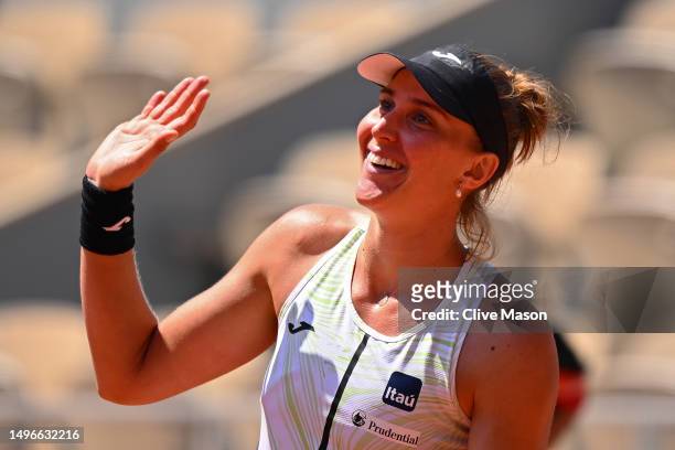 Beatriz Haddad Maia of Brazil celebrates winning match point against Ons Jabeur of Tunisia during the Women's Singles Quarter Final match on Day...