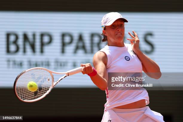 Iga Swiatek of Poland plays a forehand against Coco Gauff of United States during the Women's Singles Quarter Final match on Day Eleven of the 2023...