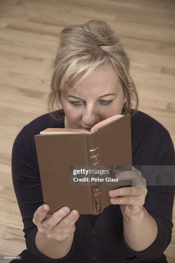 Woman reading a book.