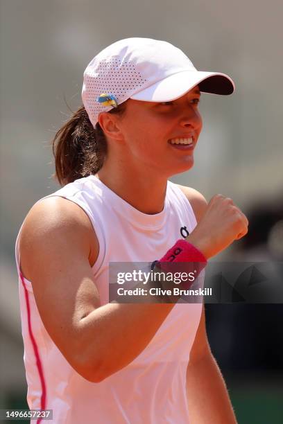 Iga Swiatek of Poland celebrates winning match point against Coco Gauff of United States during the Women's Singles Quarter Final match on Day Eleven...