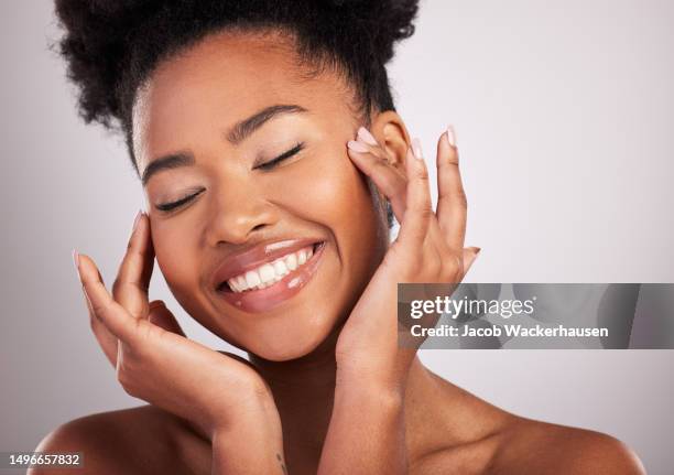 Skincare, woman smile and face closeup of beauty, dermatology and facial treatment. Spa, wellness and skin glow aesthetic with a studio background with young female, cosmetics and makeup shine