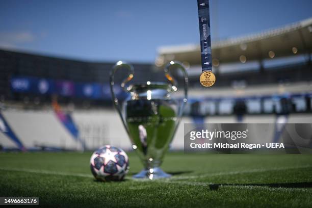 Champions League winners medal is seen with the official match ball and the Champions League trophy at the Ataturk Olympic Stadium ahead of the UEFA...