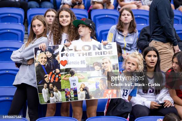 Fans hold up a sign saying A-Long for the ride in support of Allie Long of of NJ/NY Gotham FC before the National Womens Soccer League match against...