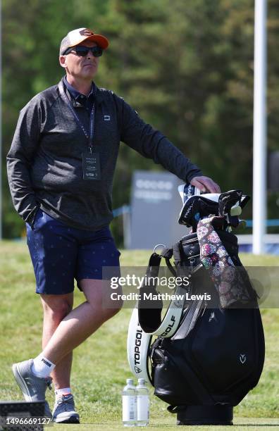 Mike Dean, Former English professional football referee and currently a video assistant referee caddying for Lydia Hall of Wales prior to the Volvo...