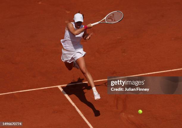 Iga Swiatek of Poland plays a forehand against Coco Gauff of United States during the Women's Singles Quarter Final match on Day Eleven of the 2023...