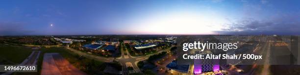 panoramic view of illuminated city against sky at night,grafton gate,milton keynes,united kingdom,uk - 360vr stock pictures, royalty-free photos & images