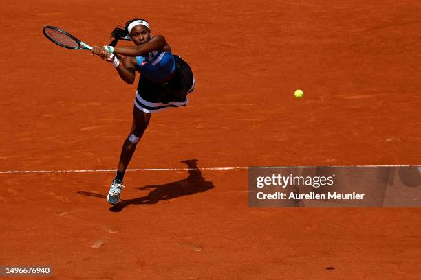 Coco Gauff of the United States of America plays a forehand against Iga Swiatek of Poland during the Women's Singles Quarterfinals match on day...