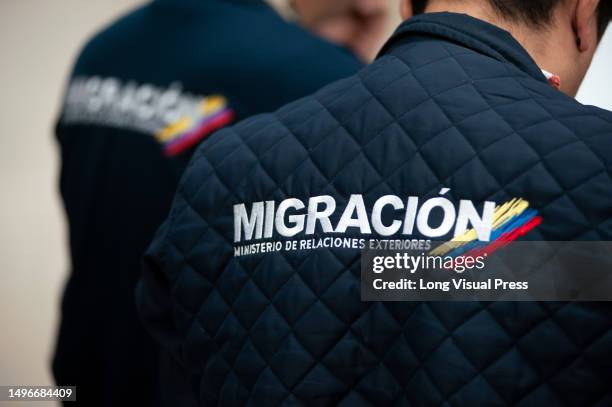 Colombia's migration officers during the launch of 'BIOMIG' a new biometric migration system aimed for foreigners in El Dorado International Airport,...