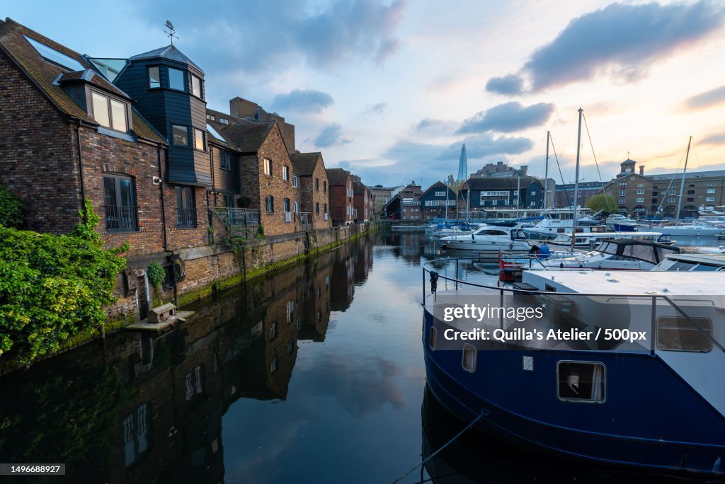 View of boats moored at harbor against sky,Londres,Inglaterra,United Kingdom,UK