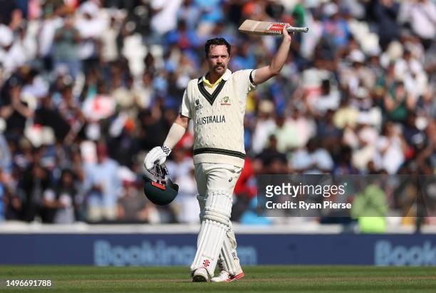 Travis Head of Australia celebrates after reaching his century during day one of the ICC World Test Championship Final between Australia and India at...