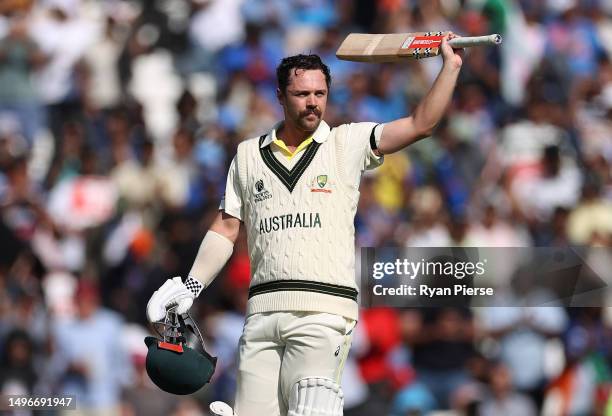 Travis Head of Australia celebrates after reaching his century during day one of the ICC World Test Championship Final between Australia and India at...