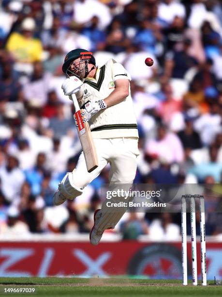 Travis Head of Australia evades a short ball during day one of the ICC World Test Championship Final between Australia and India at The Oval on June...