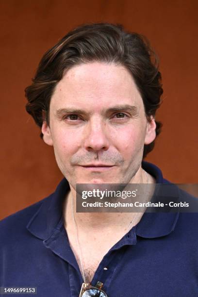 Daniel Brühl attends the 2023 French Open at Roland Garros on June 07, 2023 in Paris, France.