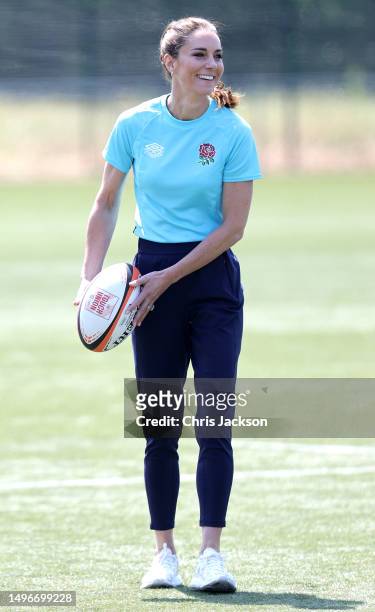 Catherine, Princess of Wales smiles as she takes part in drills during her visit to Maidenhead Rugby Club on June 07, 2023 in Maidenhead, England....