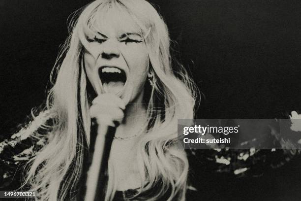 the female rock singer. - músico de rock imagens e fotografias de stock