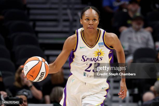 Azura Stevens of the Los Angeles Sparks dribbles during the first quarter against the Seattle Storm at Climate Pledge Arena on June 06, 2023 in...