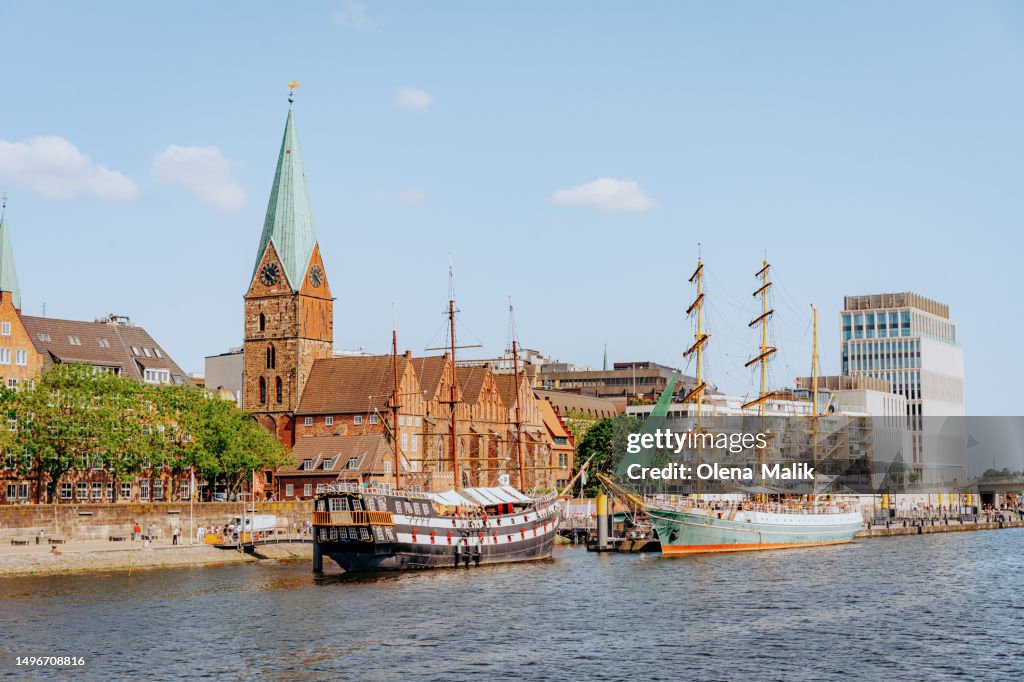View to boardwalk Schlachte, Saint Martin's Church and Martini landing pier in Bremen, Germany