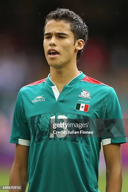 Diego Reyes of Mexico looks on during the Men's Football first round Group B match between Mexico and Switzerland on Day 5 of the London 2012 Olympic...