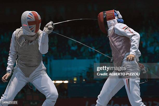 Britain's Anna Bentley fences against Egypt's Eman Gaber during the women's foil team session as part of the fencing event of London 2012 Olympic...