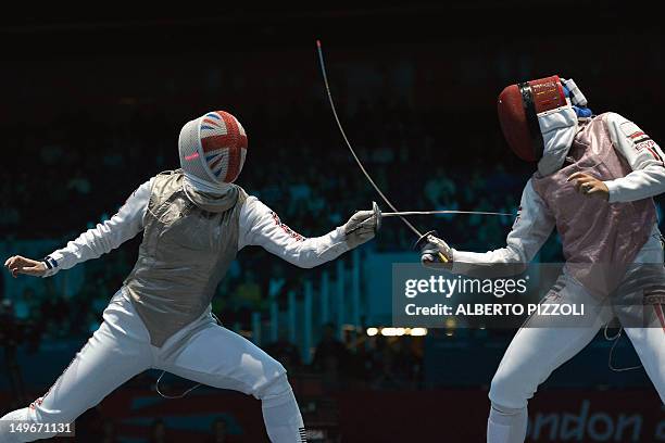 Britain's Anna Bentley fences against Egypt's Eman Gaber during the women's foil team session as part of the fencing event of London 2012 Olympic...