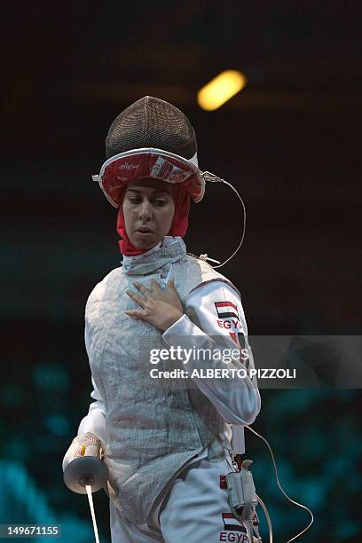 Egypt's Eman Gaber reacts against Britain's Anna Bentley during their fights in the women's foil team session as part of the fencing event of London...