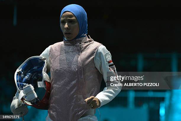 Egypt's Eman Gaber reacts against Britain's Anna Bentley during their fights in the women's foil team session as part of the fencing event of London...