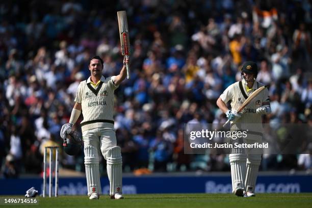 Travis Head of Australia celebrates after scoring a century as Steve Smith of Australia applaudsduring day one of the ICC World Test Championship...