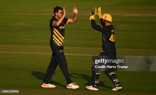 Peter Hatzoglou of Glamorgan celebrates the wicket of Will Jacks of Surrey during the Vitality T20 Blast match between Glamorgan and Surrey at Sophia...