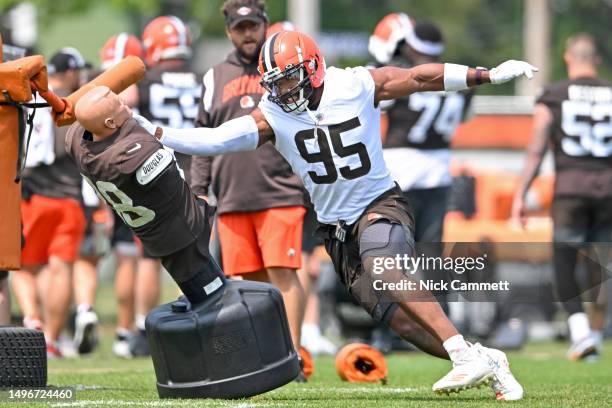 Myles Garrett of the Cleveland Browns runs a drill during the Cleveland Browns mandatory veteran minicamp at CrossCountry Mortgage Campus on June 7,...