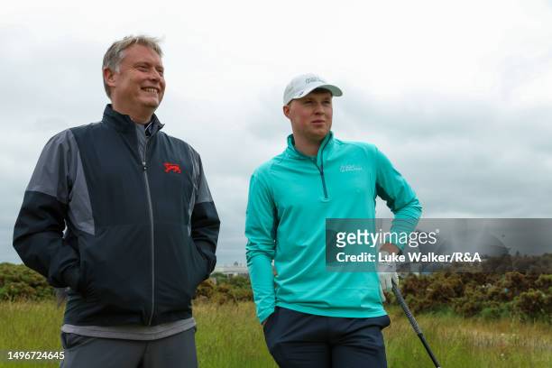 Mark Power of Ireland and Stuart Wilson look on during previews for the Walker Cup St Andrews New Course on June 07, 2023 in St Andrews, Scotland.