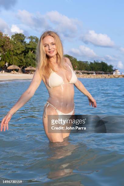 Actress Heather Graham soaked up the sun and enjoyed the warm Caribbean water while vacationing at Sandals South Coast Resort in Jamaica on June 04,...