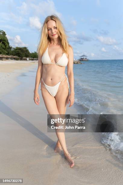 Actress Heather Graham soaked up the sun and enjoyed the warm Caribbean water while vacationing at Sandals South Coast Resort in Jamaica on June 04,...