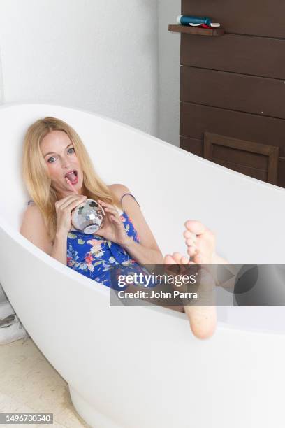 Actress Heather Graham soaked up the sun and enjoyed the warm Caribbean water while vacationing at Sandals South Coast Resort in Jamaica on June 04,...