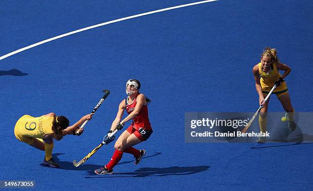 Anna Flanagan of Australia scores the opening goal during the Women's Hockey preliminary match between Australia and United States on Day 6 of the...