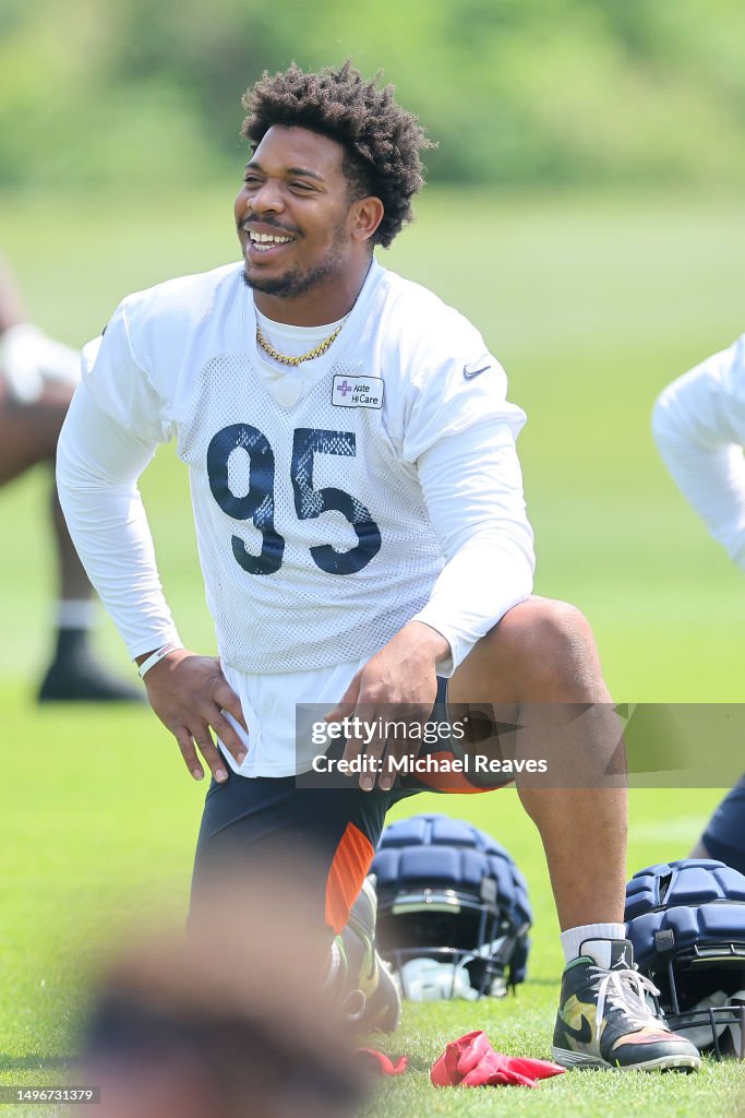 DeMarcus Walker of the Chicago Bears stretches during OTA's at Halas ...