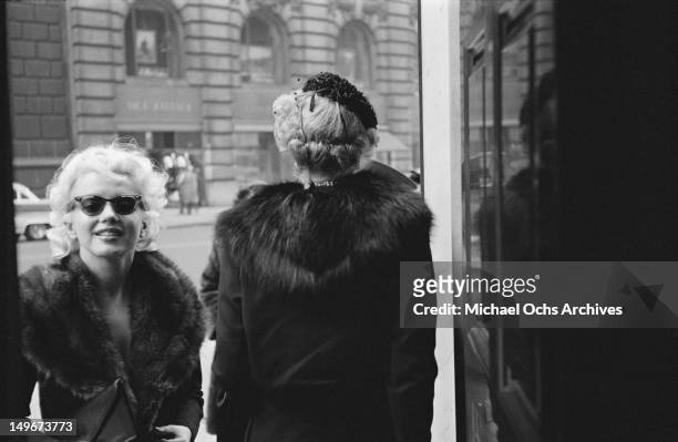 American actress Marilyn Monroe outside the Elizabeth Arden salon in New York City, March 1955.