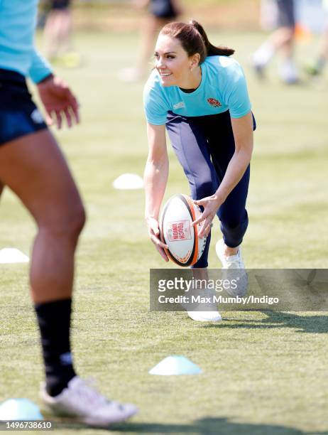 Catherine, Princess of Wales takes part in a game of walking touch rugby as she visits Maidenhead Rugby Club on June 7, 2023 in Maidenhead, England....