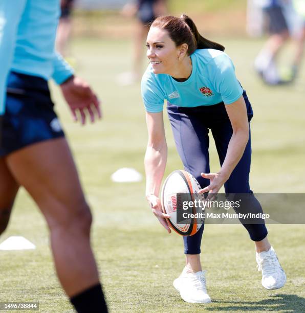 Catherine, Princess of Wales takes part in a game of walking touch rugby as she visits Maidenhead Rugby Club on June 7, 2023 in Maidenhead, England....