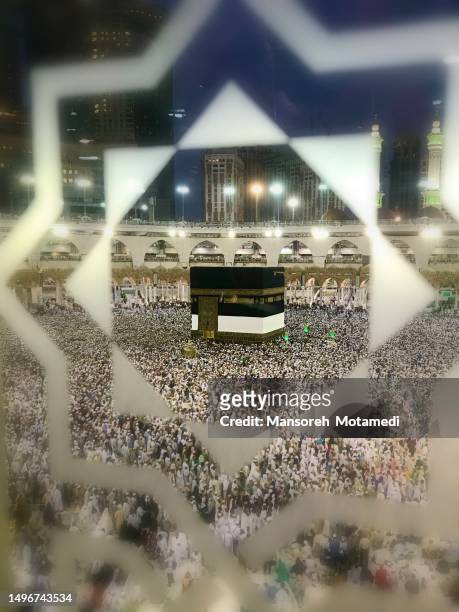 ‎‏pilgrims in al-haram mosque - kaaba stock pictures, royalty-free photos & images