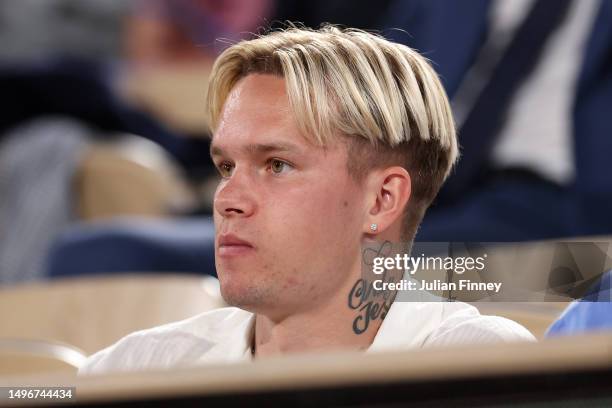 Chelsea Footballer, Mykhailo Mudryk, watches on from the crowd during the Men's Singles Quarter Final match between Holger Rune of Denmark and Casper...