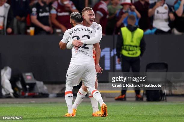 Said Benrahma of West Ham United celebrates with teammate Jarrod Bowen after scoring the team's first goal from the penalty spot during the UEFA...