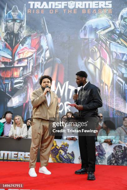 Steven Caple Jr and Tega Alexander speak onstage during the European Premiere of Paramount Pictures' "Transformers: Rise of the Beasts" at Cineworld...