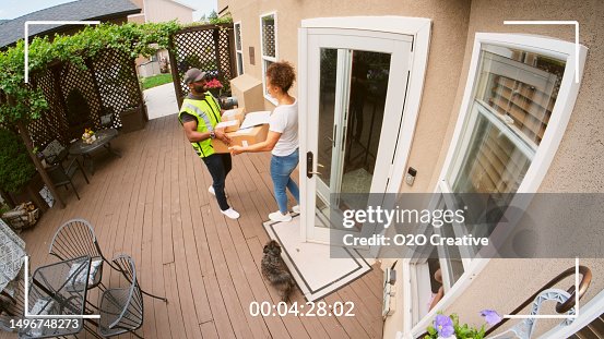 Home Security Camera Footage of Package Delivery Home Security Camera Footage of Package Delivery